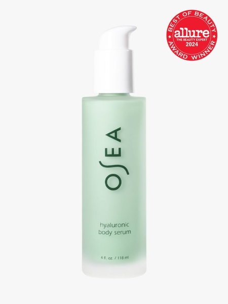 body serum in branded clear bottle with white pump on light gray background&nbsp;with red and white 2024 allure best of beauty seal