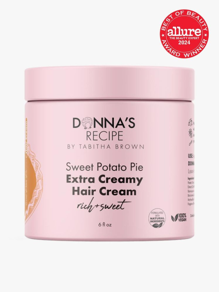 hair cream in branded pink jar with lid on light gray background&nbsp;with red and white 2024 allure best of beauty seal