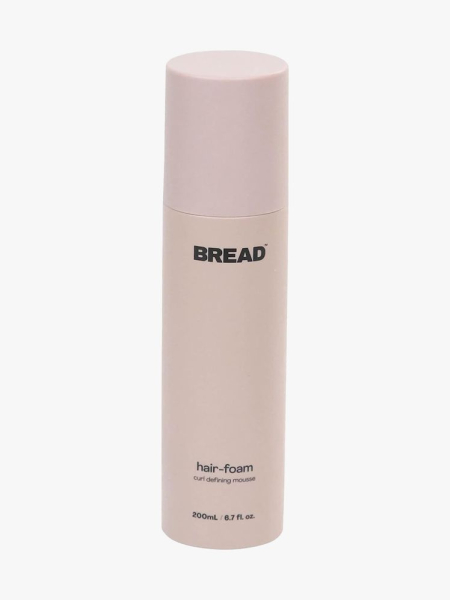 Bread Beauty Supply Hair-Foam: Curl Defining Mousse light pink bottle on light gray background